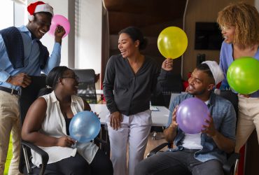 office-coworkers-celebrating-event-with-balloons